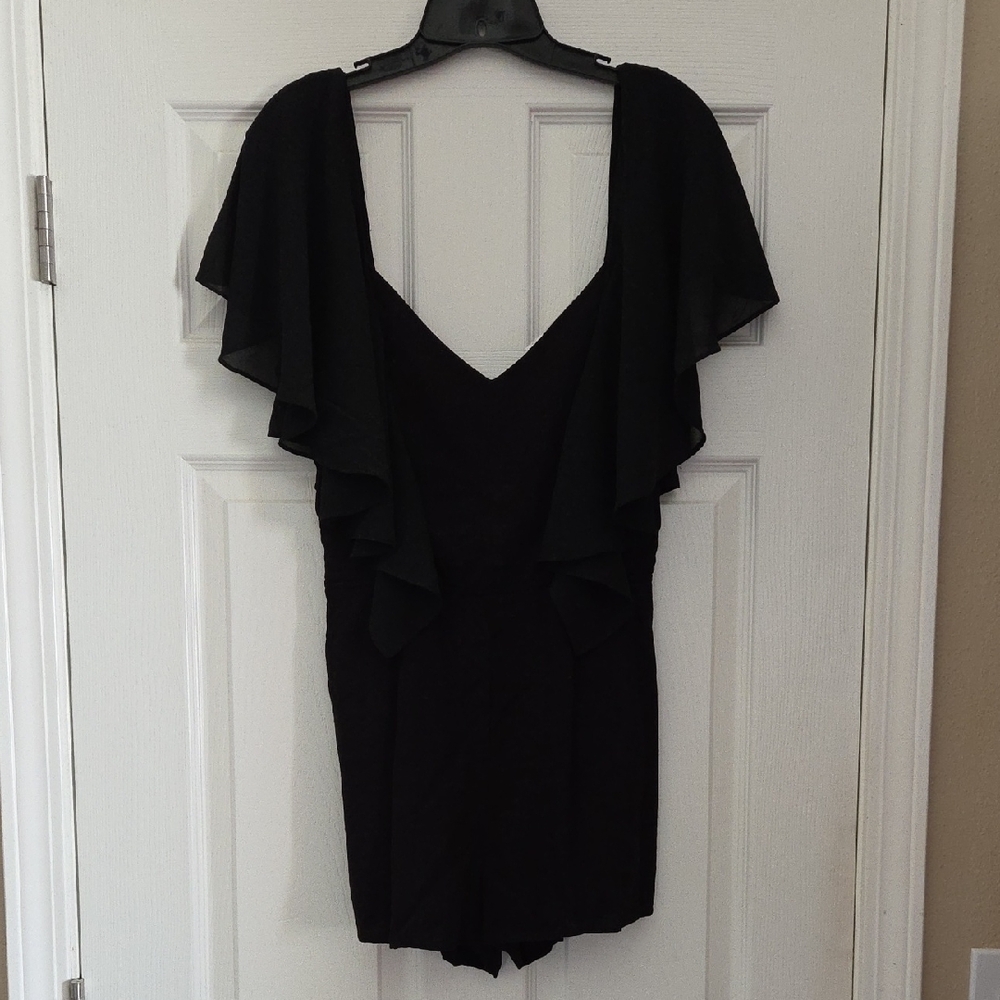 Flirty Black Ruffle Sleeve Romper
